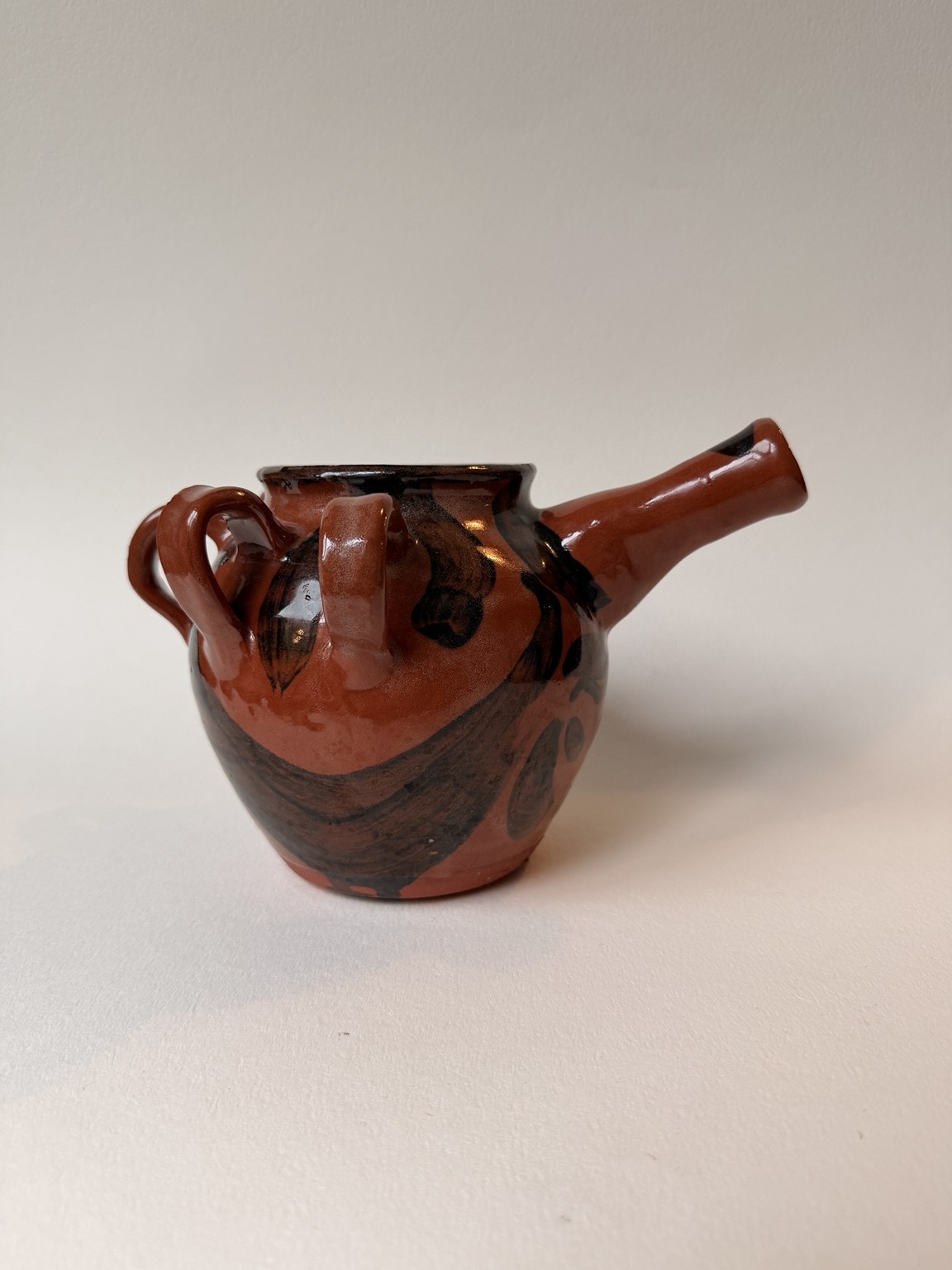 Red Spouted Vessel