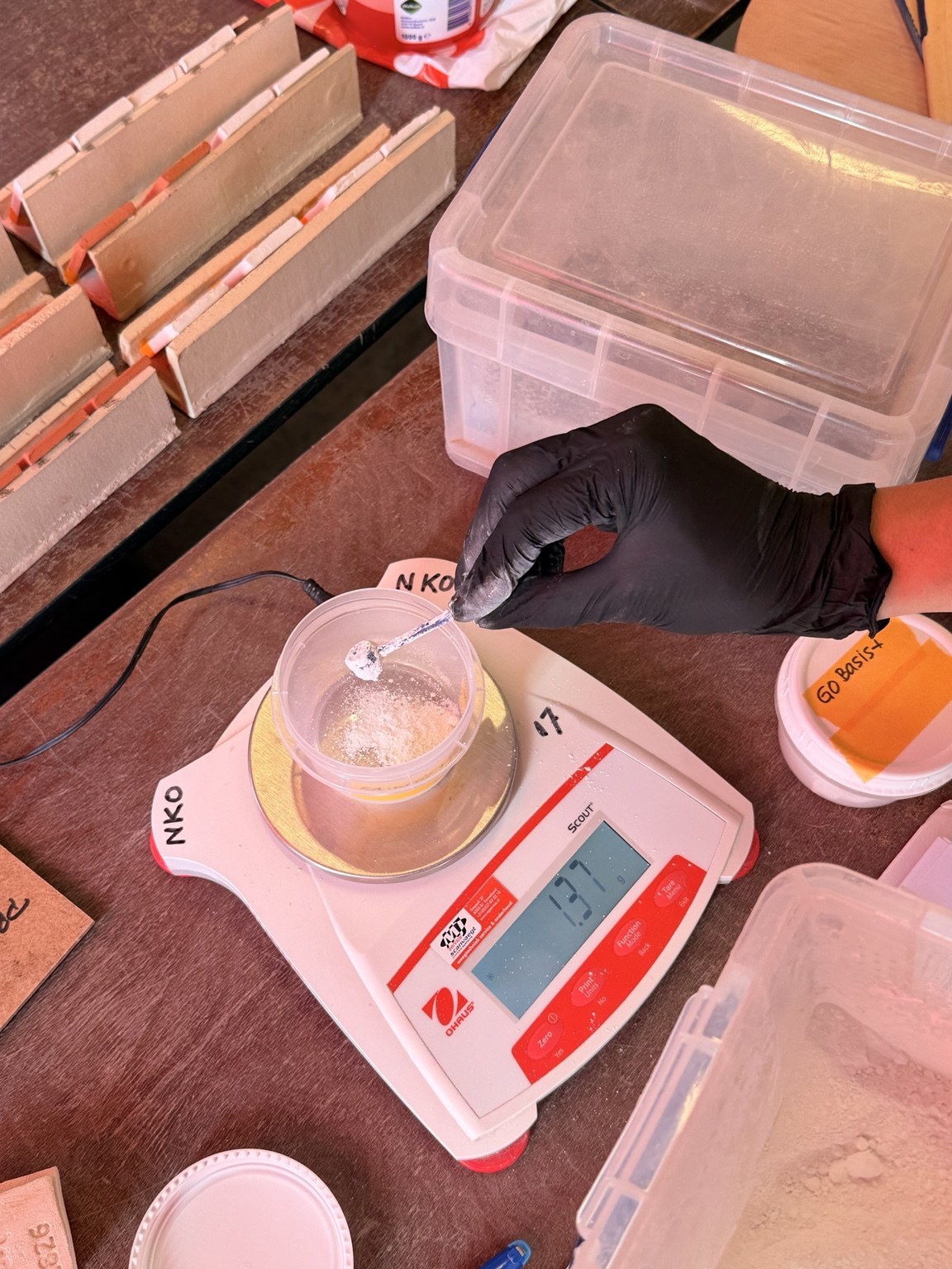 Weighing a glaze ingredient on a digital scale